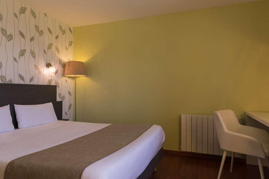 Logis Aux Maisons Room photo